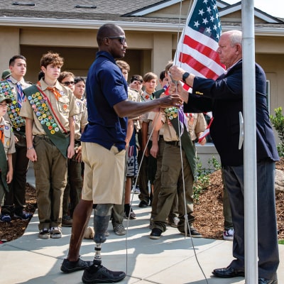 Homes For Our Troops - Raising the flag